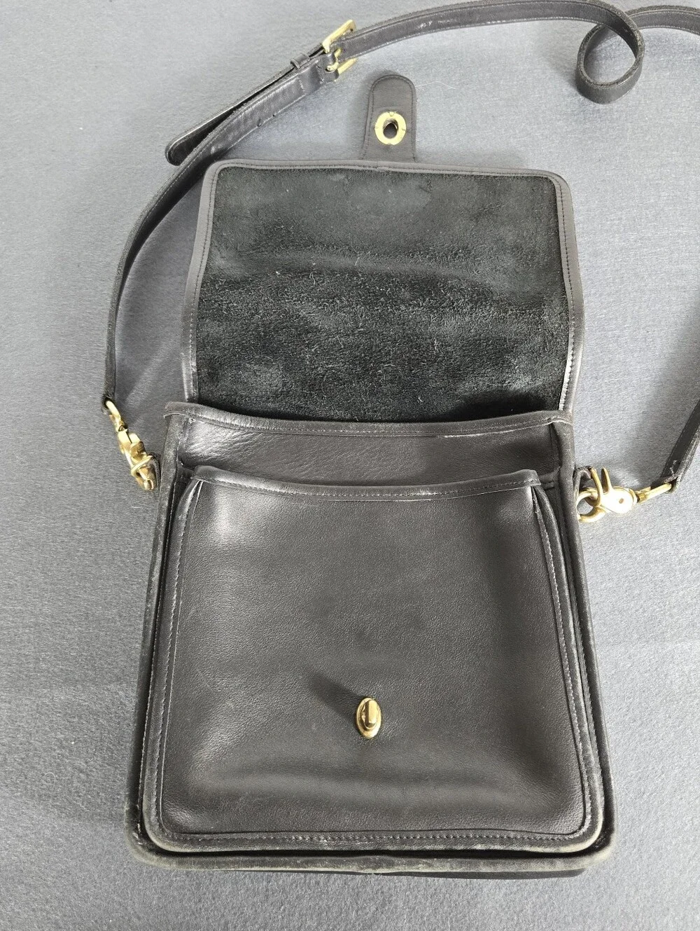 Coach logo embossed